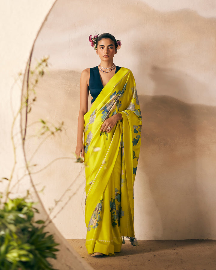 satin saree with paired with a dark contrast blouse