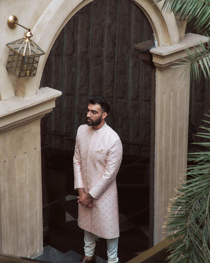 TEJASHWAR SANDHOO IN DULL PINK SHERWANI